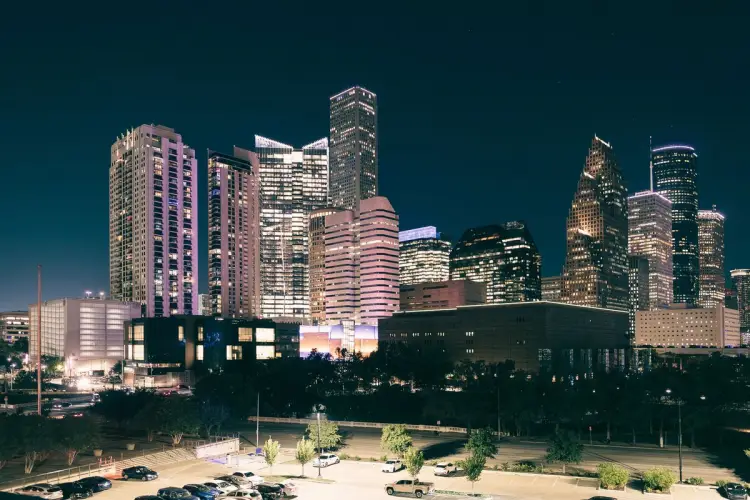 Downtown Houston skyline lit up at night.jpg