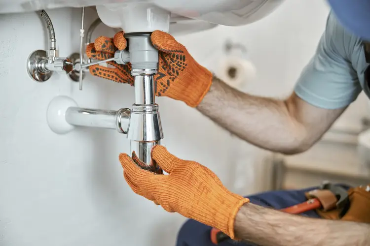 male-plumber-hands-fixing-metal-.jpg