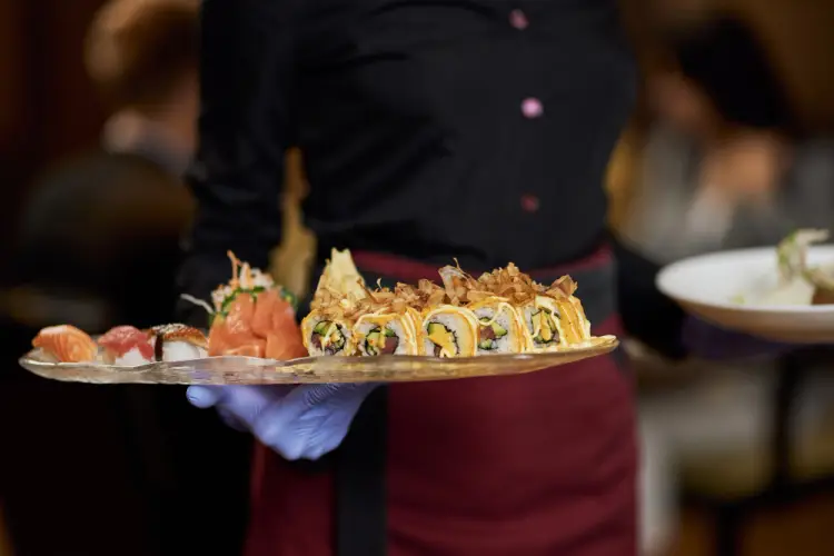sushi-restaurant-waiter-serving.jpg