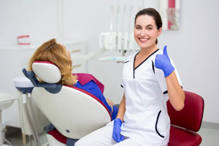 female-dentist-thumbs-up.jpg