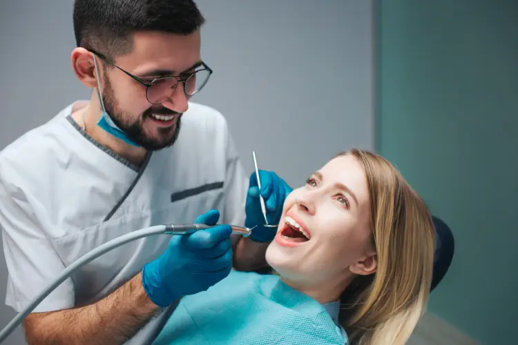 dentist-performing-professional-cleaning.jpg