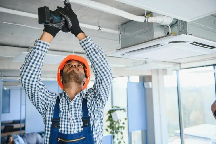professional-technician-maintaining-modern-air-conditioner-indoors-space-text_255667-51624.jpg