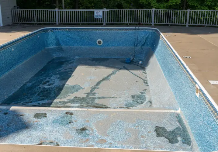 damaged-inground-pool-with-worn-liner.jpg