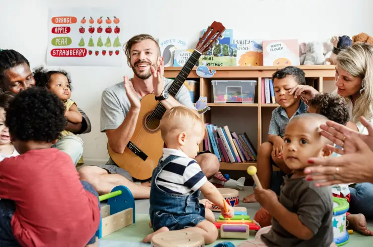 music-time-with-teacher-and-kids-in-daycare.jpg
