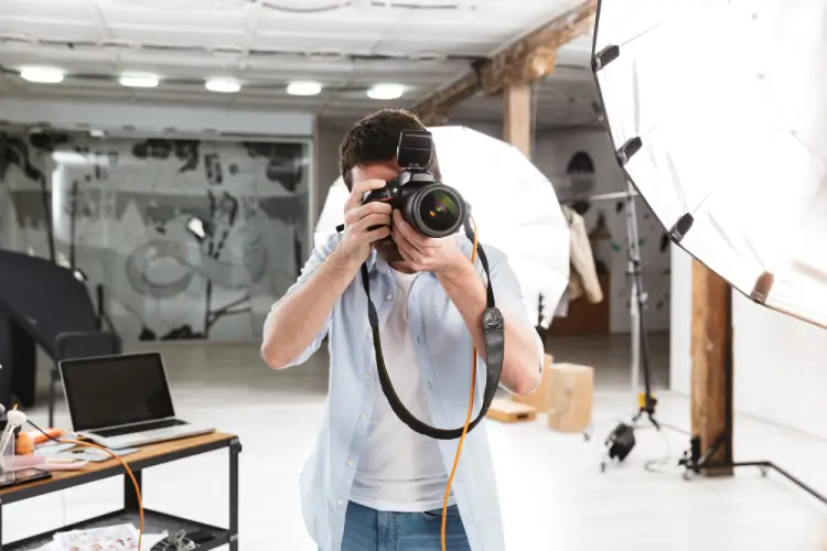 photographer-in-studio-with-camera.jpg