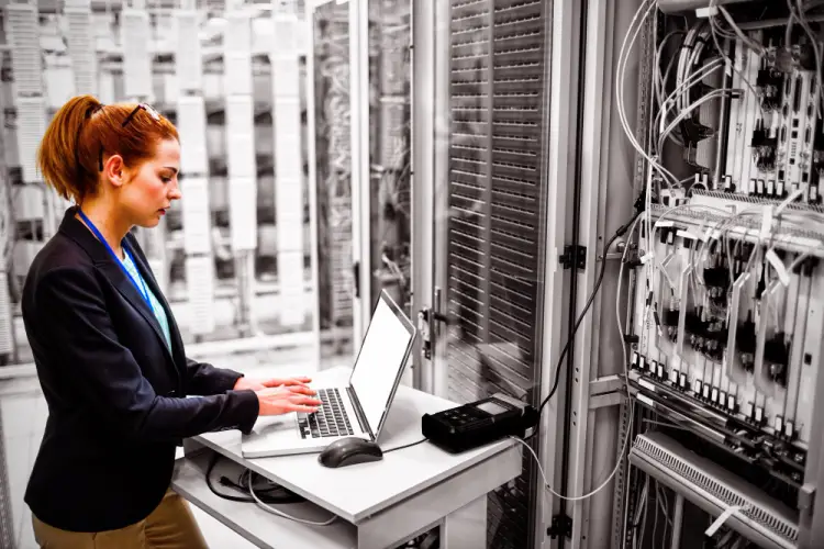 female-technician-managing-data-center-infrastructure.jpg