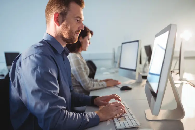office-workers-on-desktop-computers.jpg