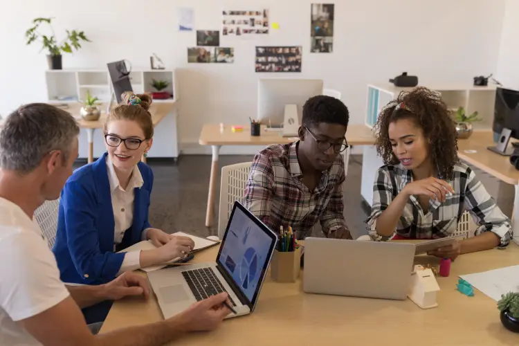 coworkers-collaborating-in-open-office-space.jpg