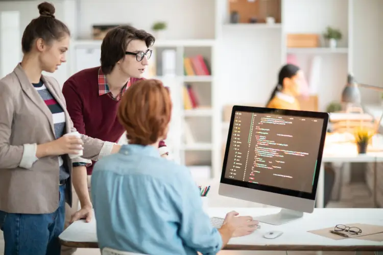 software-coding-team-reviewing-project-on-computer.jpg