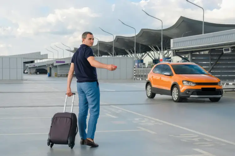 traveler-waving-for-orange-cab.jpg