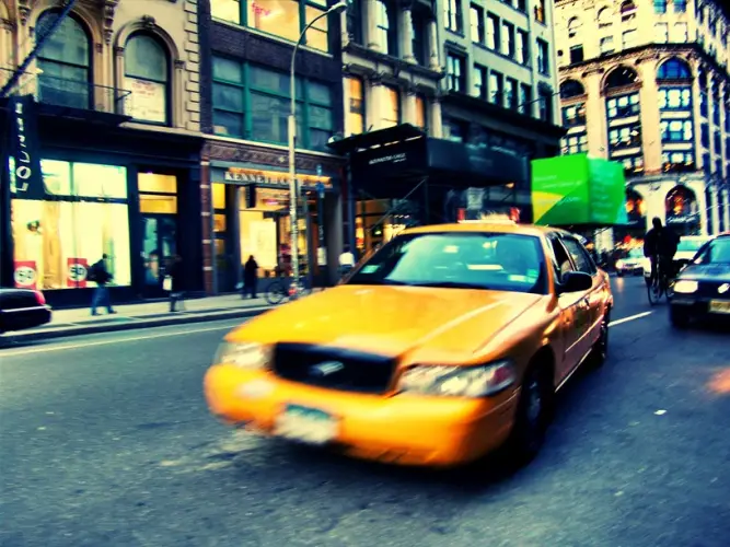 blurred-motion-yellow-taxi-city-street.jpg