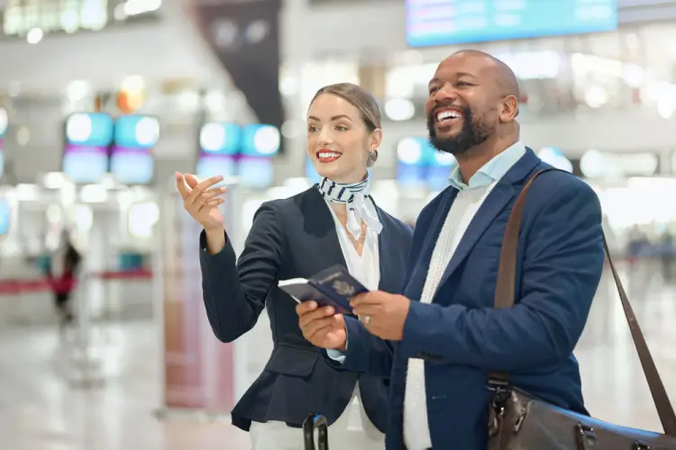 airport-staff-giving-directions-to-passenger.jpg