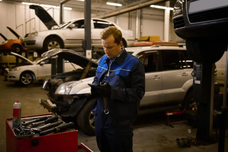 senior-mechanic-working-on-vehicle.jpg