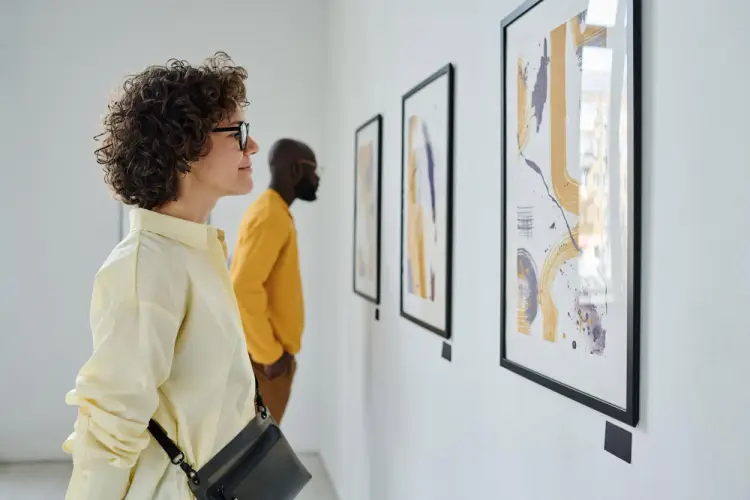 visitors-viewing-abstract-art-on-wall.jpg