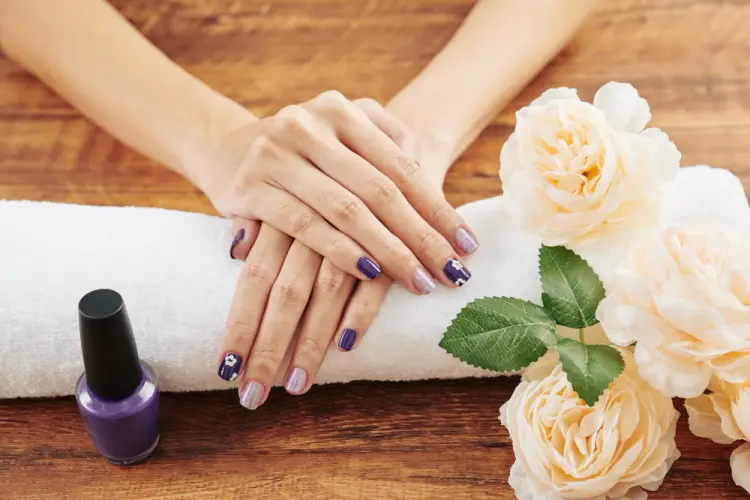 elegant-manicured-nails-with-flowers.jpg