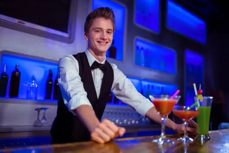 smiling-bartender-serving-drinks.jpg