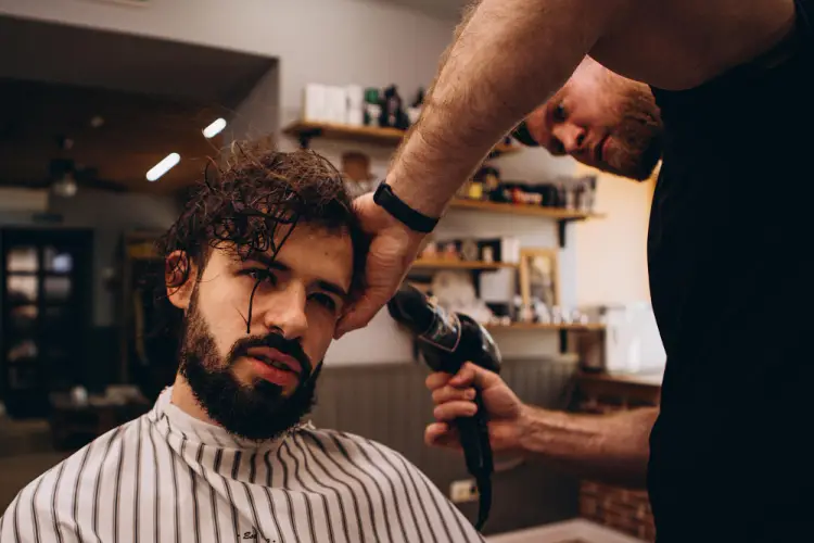 barber-blow-drying-hair-of-wet-haired-man.jpg
