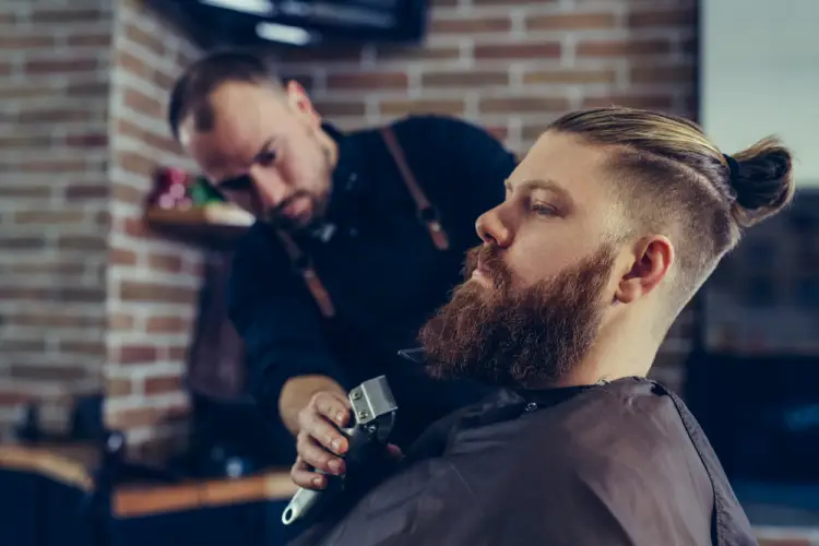 barber-trimming-beard-modern-hairstyle.jpg