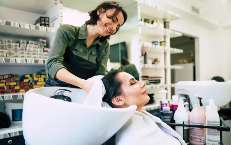 hair-salon-stylist-working-with-client.jpg