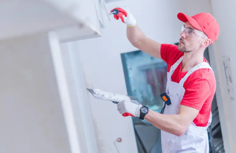 construction-worker-applying-plaster.jpg