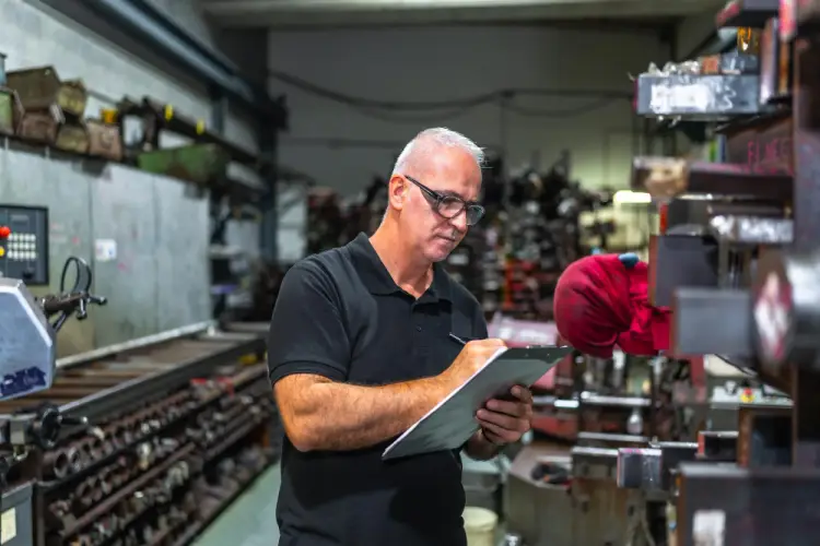 factory-supervisor-inspecting-machines.jpg