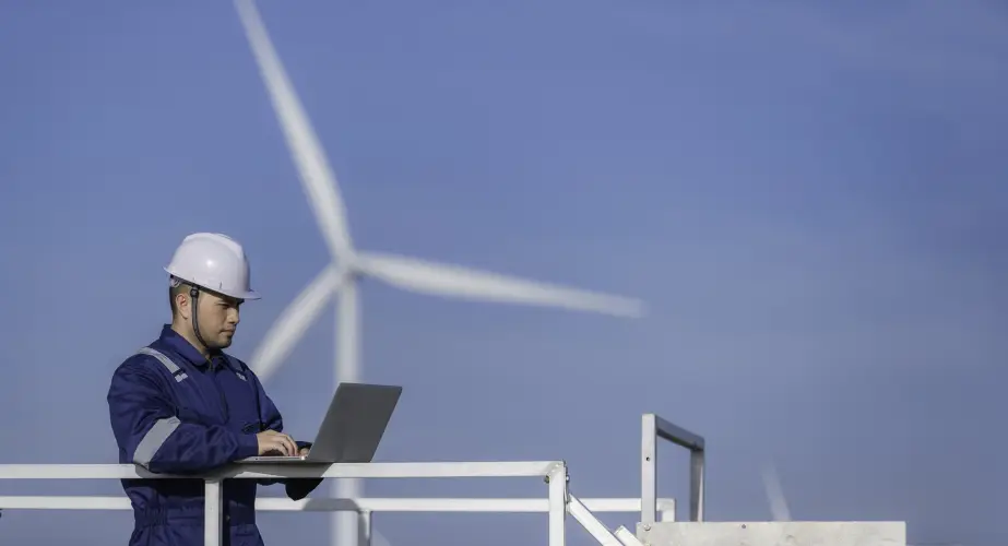 two-engineers-working-holding-report-wind-turbine-farm-power-generator-station-mountainthailand-peopletechnician-man-woman-discuss-about-work.jpg