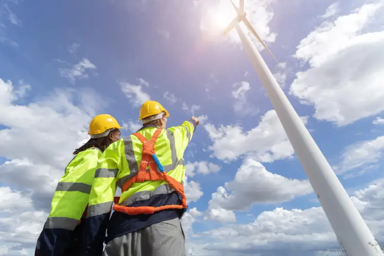 engineers-pointing-at-wind-turbine.jpg