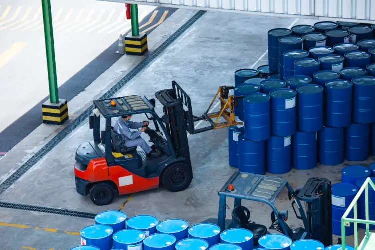 forklifts-moving-chemical-barrels.jpg