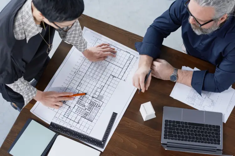 architects-reviewing-building-layout.jpg