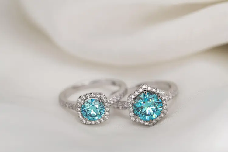 blue-diamond-engagement-rings-on-white.jpg