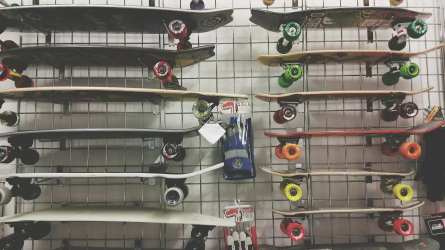 low-angle-view-multi-colored-skateboard-sale-store.jpg
