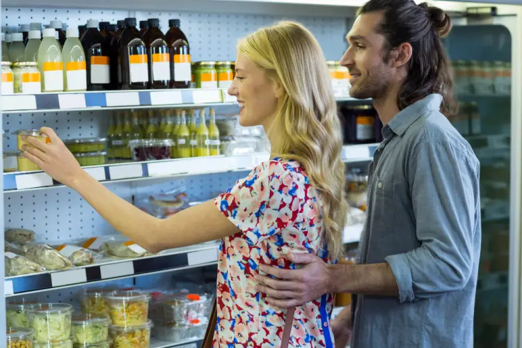 girl-shopping-supermarket-shelves.jpg