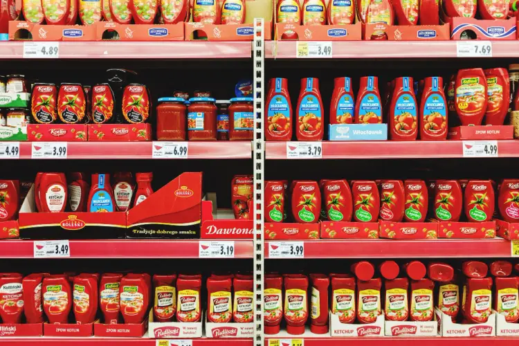 grocery-shelf-stocked-with-various-ketchup-brands.jpg