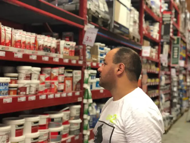 man-shopping-in-hardware-store-aisle.jpg