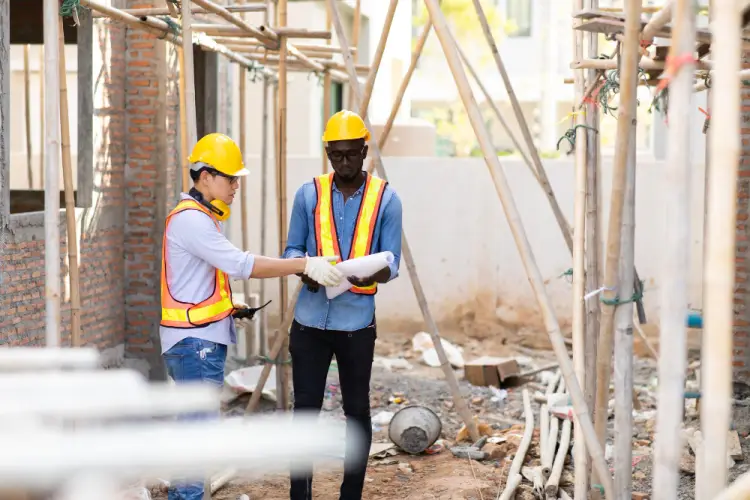 construction-site-supervisors-reviewing-plans.jpg