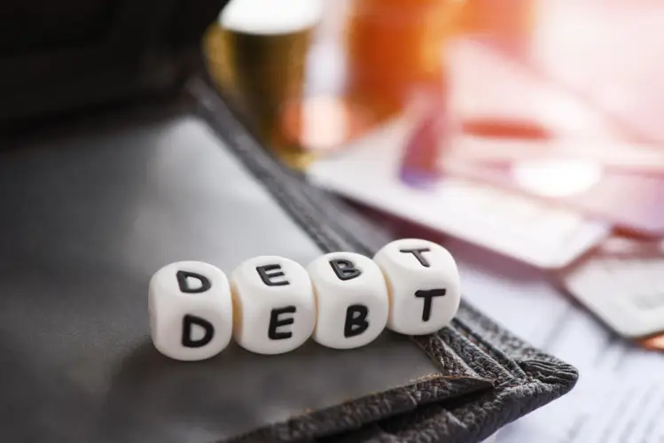 credit-card-debt-concept-cubes-on-wallet.jpg