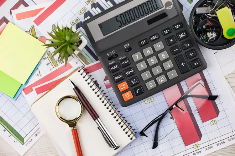 financial-tools-and-charts-on-office-desk.jpg