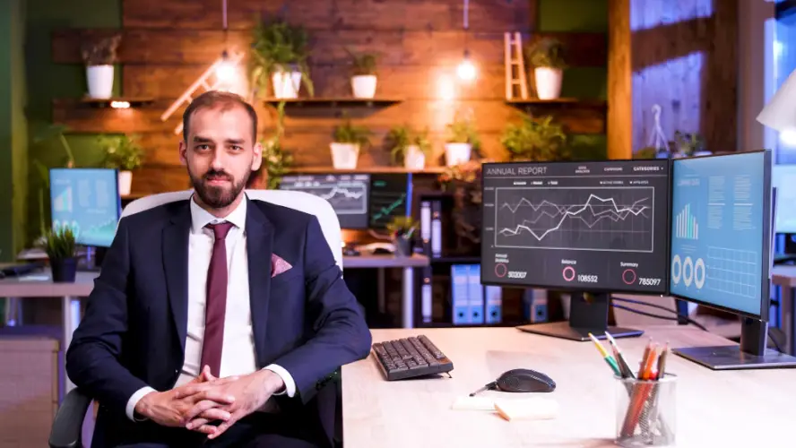 professional-trader-with-analytics-screens.jpg