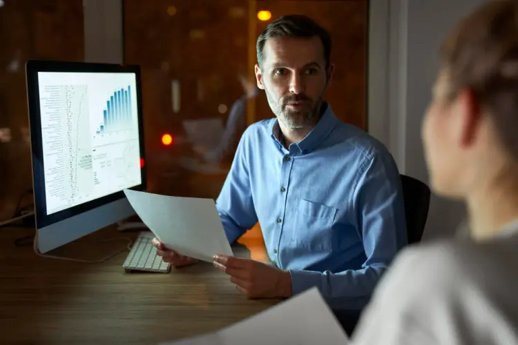 man-analyzing-data-on-desktop.jpg