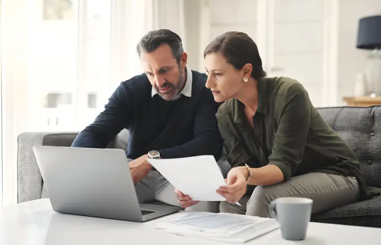 couple-discussing-finances-on-laptop.jpg