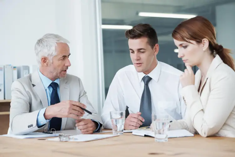 financial-advisor-advising-clients.jpg