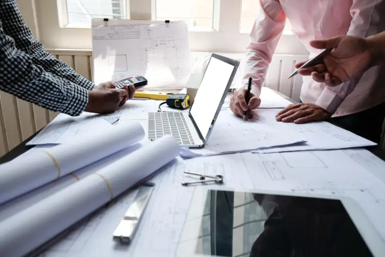 civil-engineering-team-blueprint-review-office.jpg