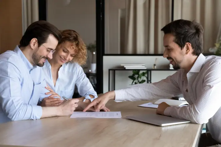 happy-couple-signing-life-insurance-plan.jpg