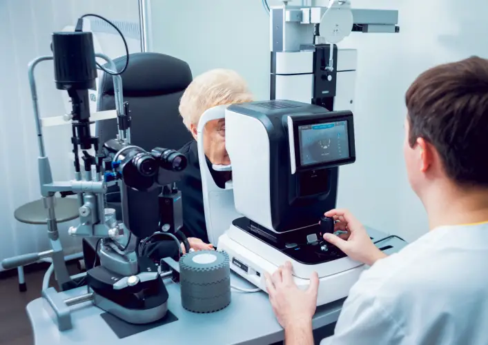 optometrist-using-digital-eye-exam-machine.jpg
