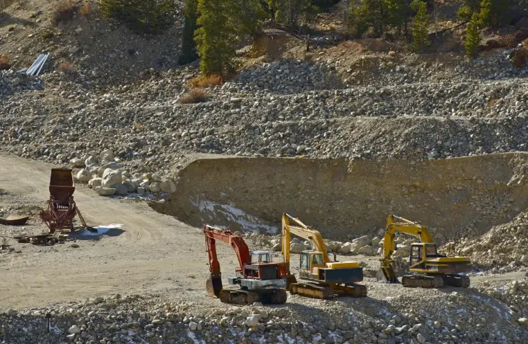 excavators-in-rock-quarry-mining-area.jpg
