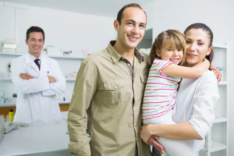 smiling-family-at-doctor-clinic-visit.jpg
