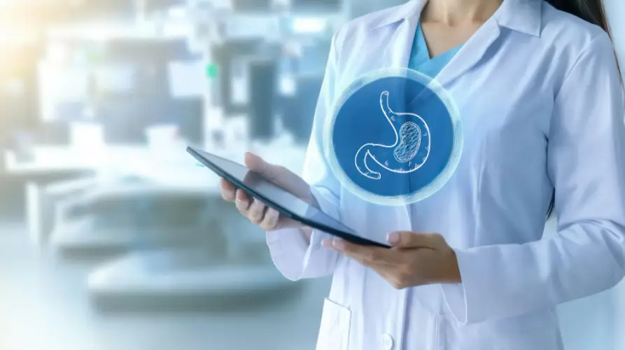 doctor-reviewing-stomach-scan-digital-tablet.jpg