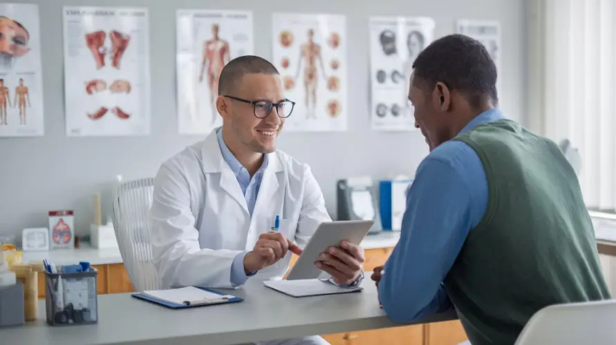 gastroenterologist-reviewing-results-with-patient.jpg