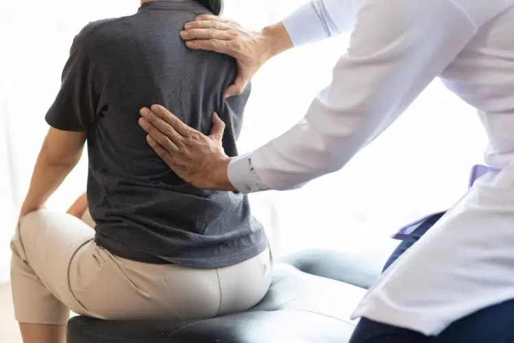 female-patient-back-exam.jpg