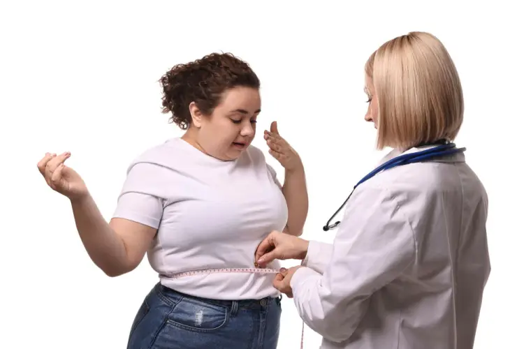 doctor-measuring-waist-woman-weight-loss.jpg
